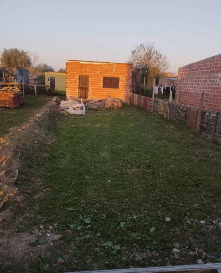 Terreno con edificacion a la venta