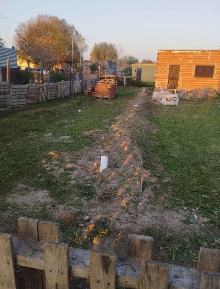 Terreno con edificacion a la venta