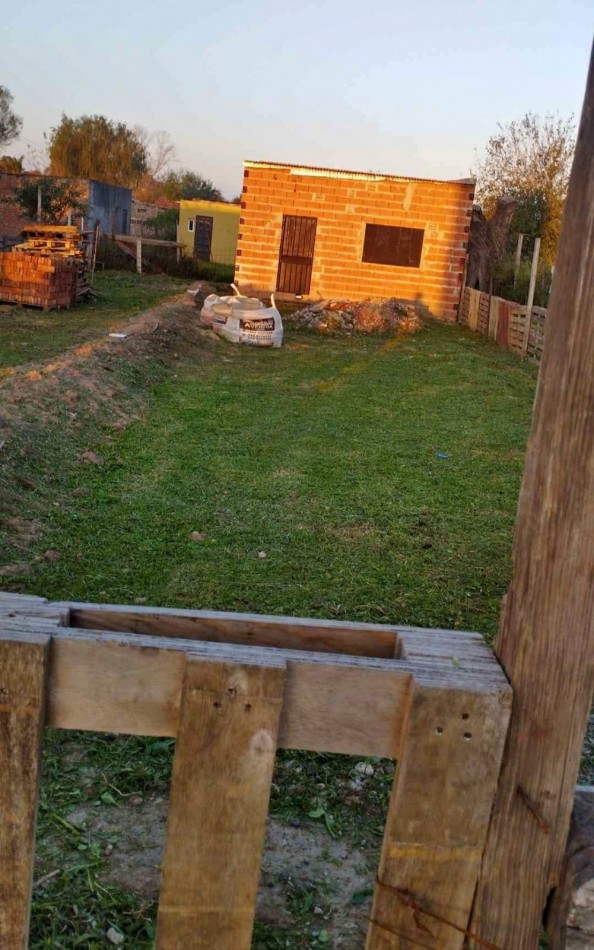 Terreno con edificacion a la venta