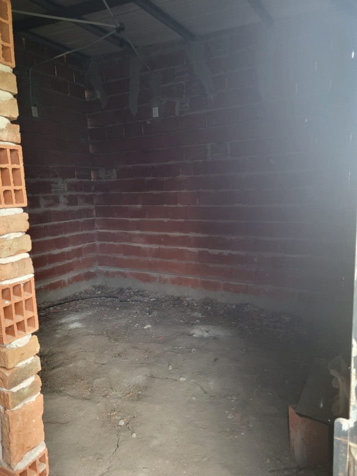 Terreno con edificacion a la venta