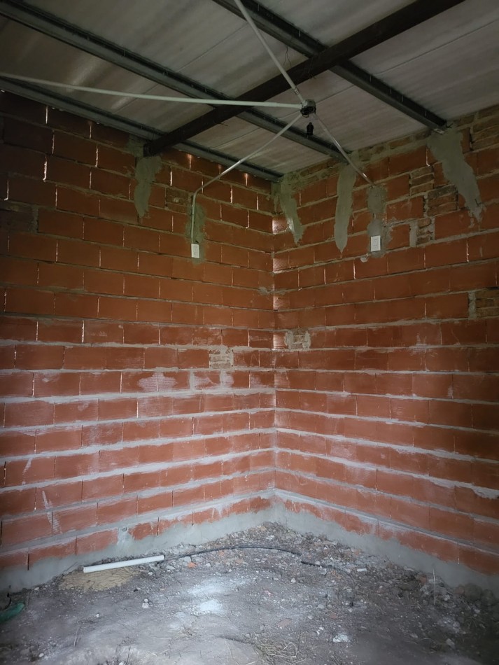 Terreno con edificacion a la venta