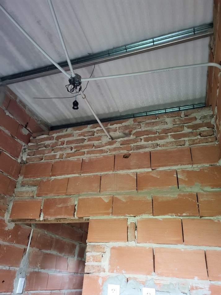 Terreno con edificacion a la venta