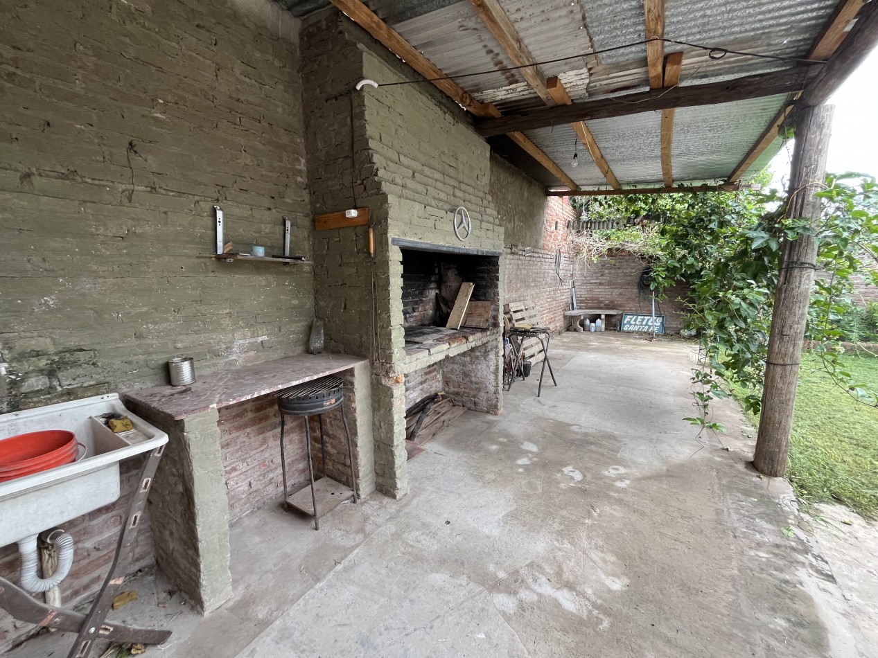 CASA CON PATIO VERDE! OPORTUNIDAD!