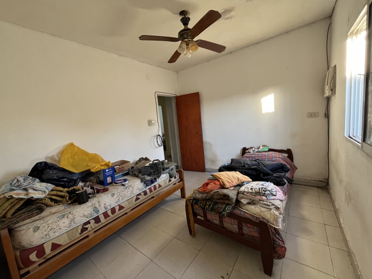 CASA CON GRAN PATIO VERDE ! IMPERDIBLE